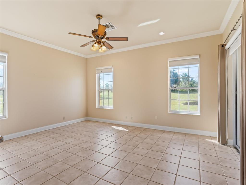1412 Meadow View Way Lady Lake, FL 32159 - Photo 12 of 37 a view of an empty room with a window
