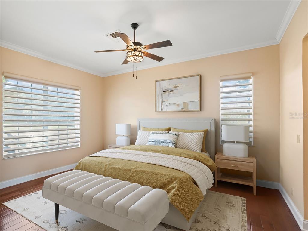 1412 Meadow View Way Lady Lake, FL 32159 - Photo 17 of 37 a bedroom with a bed and a window