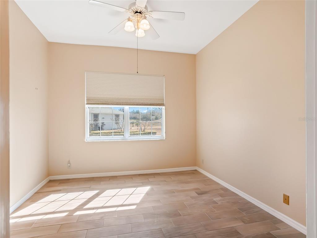 1412 Meadow View Way Lady Lake, FL 32159 - Photo 23 of 37 an empty room with a window