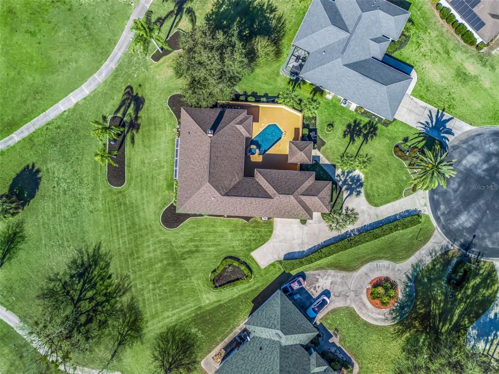 1412 Meadow View Way Lady Lake, FL 32159 - Photo 5 of 37 an aerial view of a house