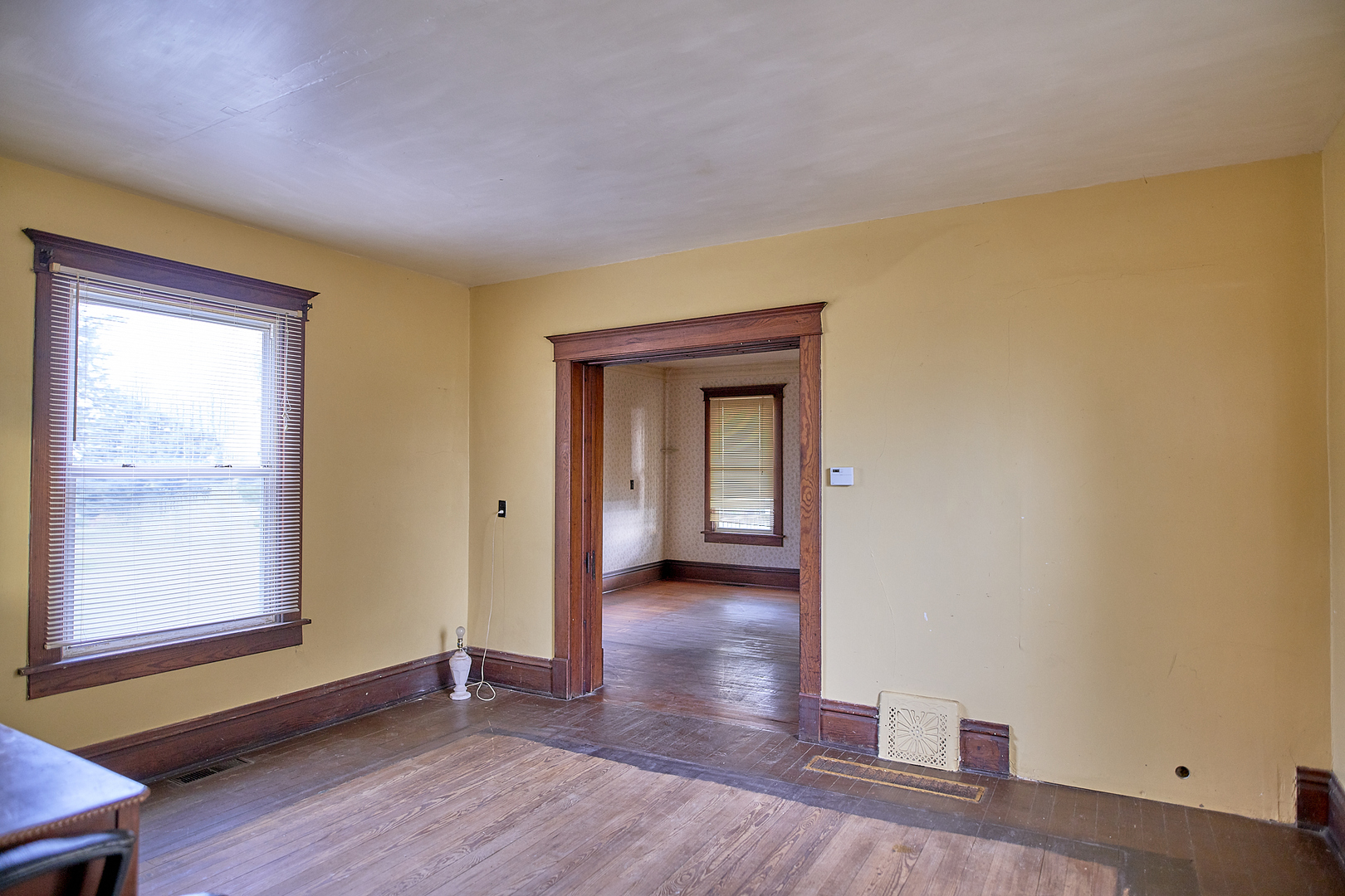 29721 East 3200 North Road Blackstone, IL 61313 - Photo 13 of 23 a view of livingroom with hardwood floor and window