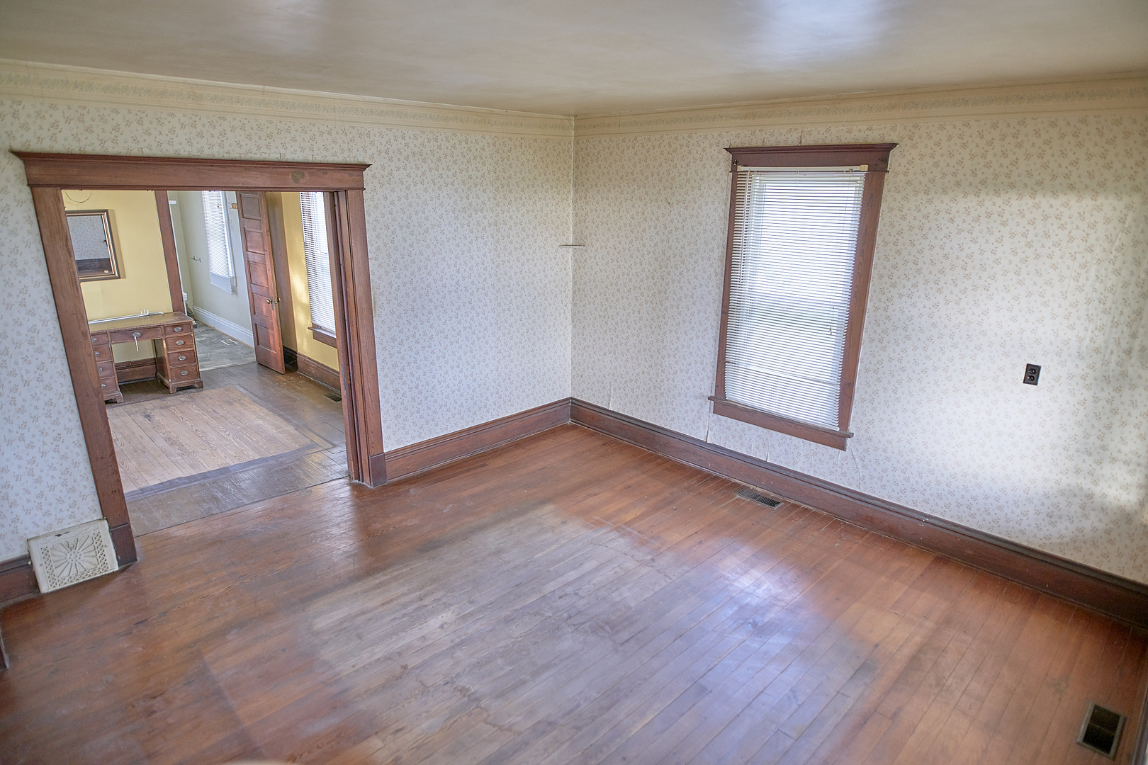 29721 East 3200 North Road Blackstone, IL 61313 - Photo 15 of 23 an empty room with wooden floor and windows