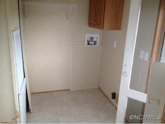 1121 Kerr Road Hendersonville, NC 28792 - Photo 5 of 10 a view of an empty room