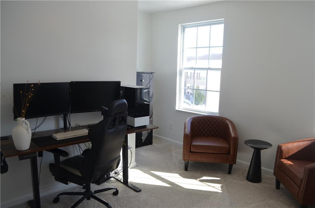 515 Galileo Drive Rostraver Township, PA 15012 - Photo 23 of 43 a living room with furniture and a window