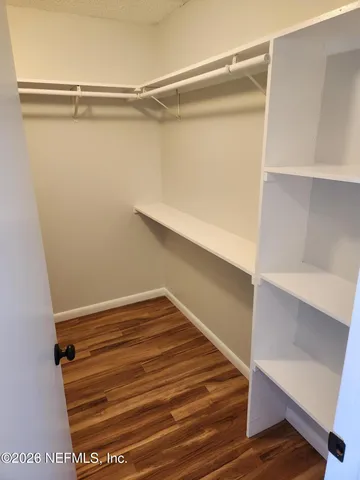 a view of a balcony with chair