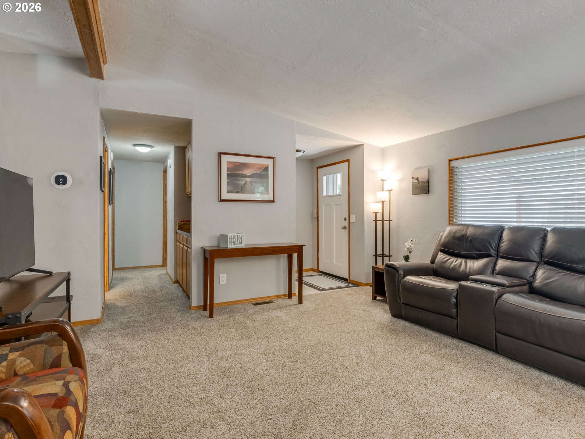4730 Auburn Road Northeast, Unit 125 Salem, OR 97301 - Photo 3 of 36 a living room with furniture and a window