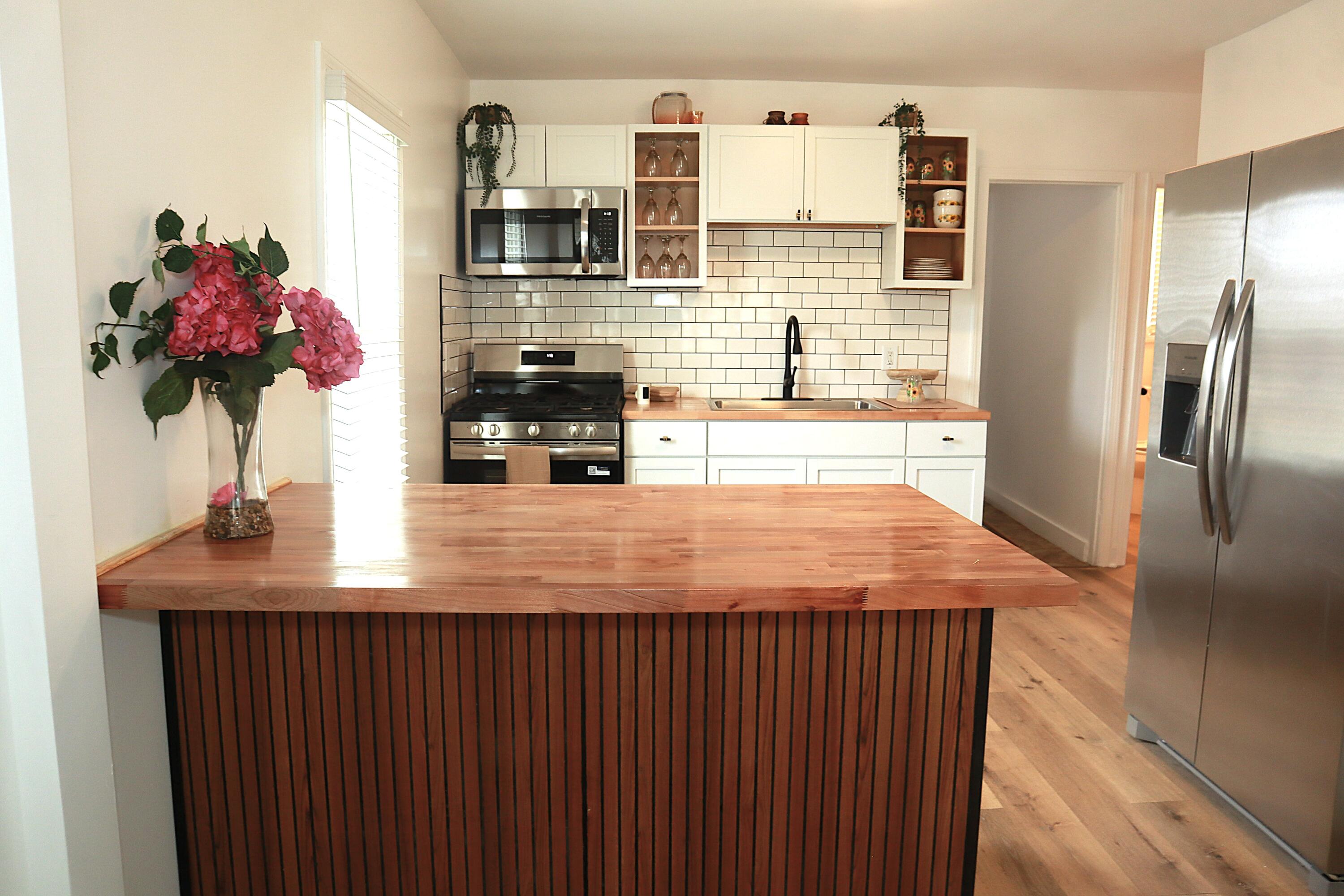 4001 Virginia Street Gary, IN 46409 - Photo 5 of 15 a kitchen with a sink refrigerator and microwave