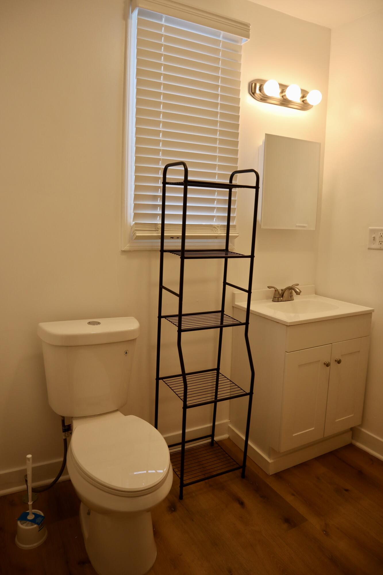 4001 Virginia Street Gary, IN 46409 - Photo 9 of 15 a bathroom with a sink toilet and shower