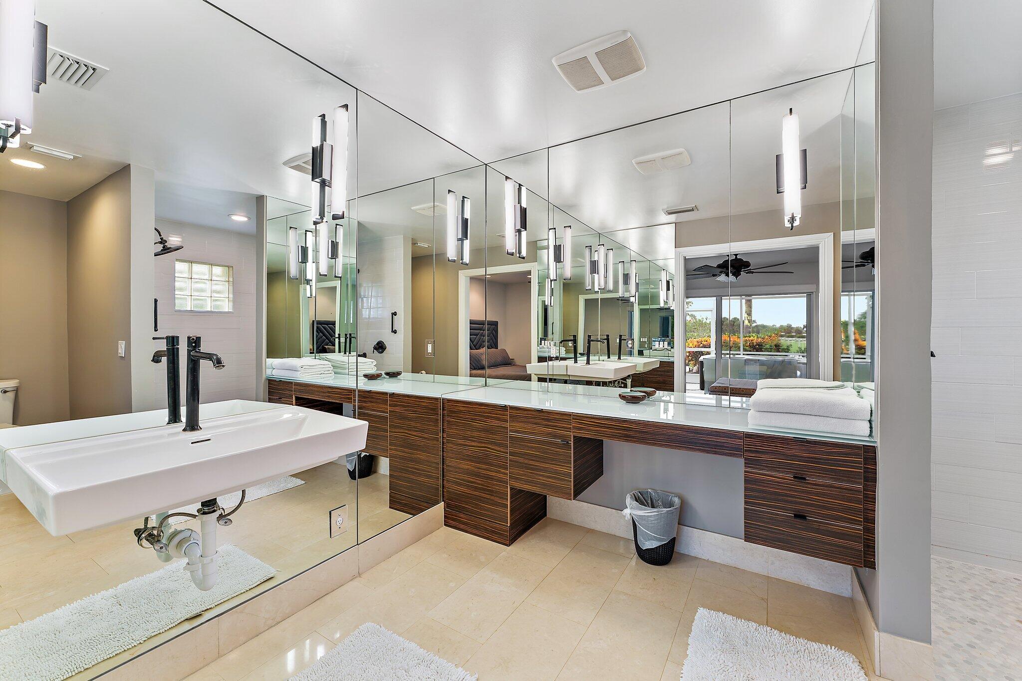 210 Golfview Drive Tequesta, FL 33469 - Photo 16 of 27 a large kitchen with a table and chairs