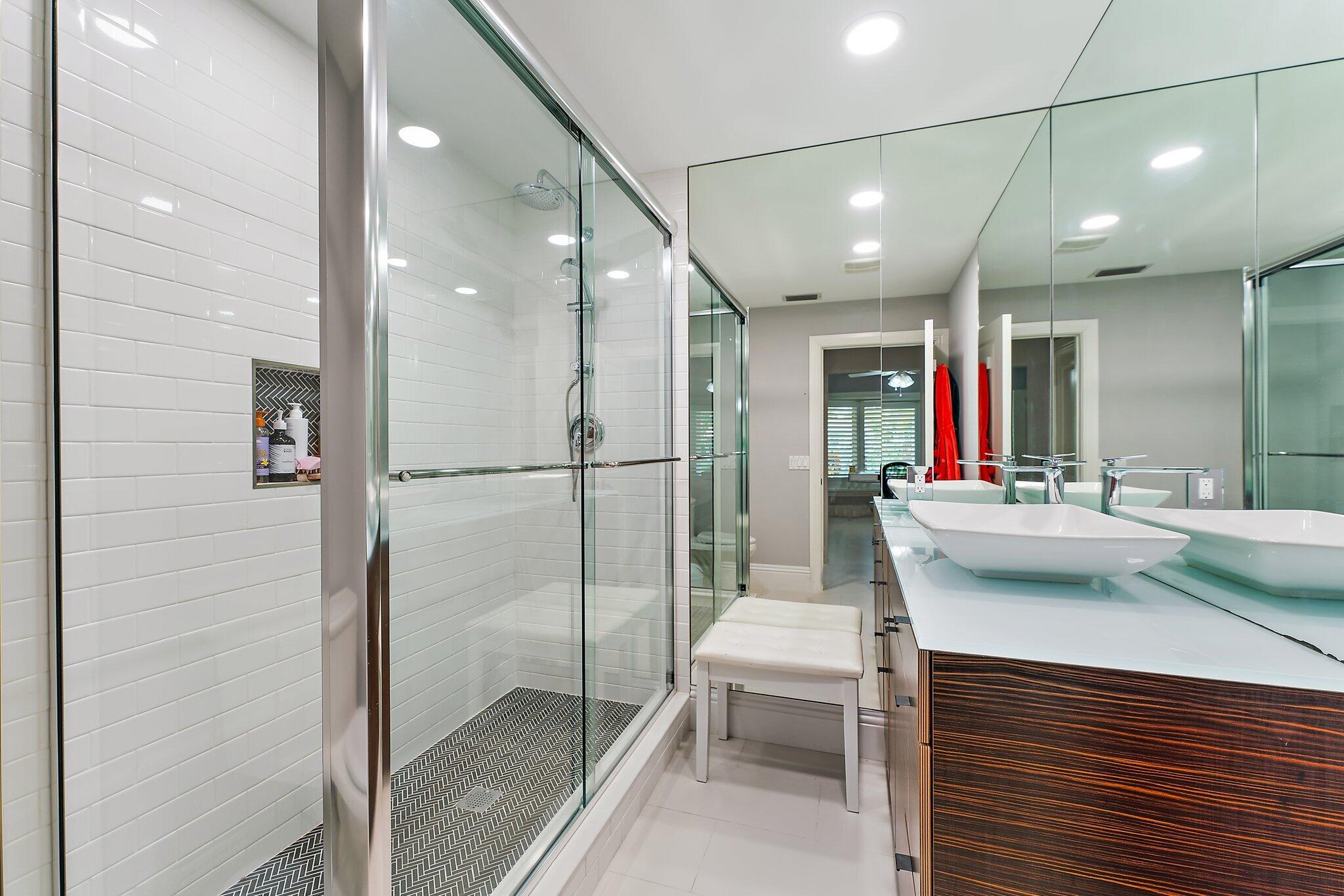 210 Golfview Drive Tequesta, FL 33469 - Photo 21 of 27 a bathroom with a sink a toilet and shower