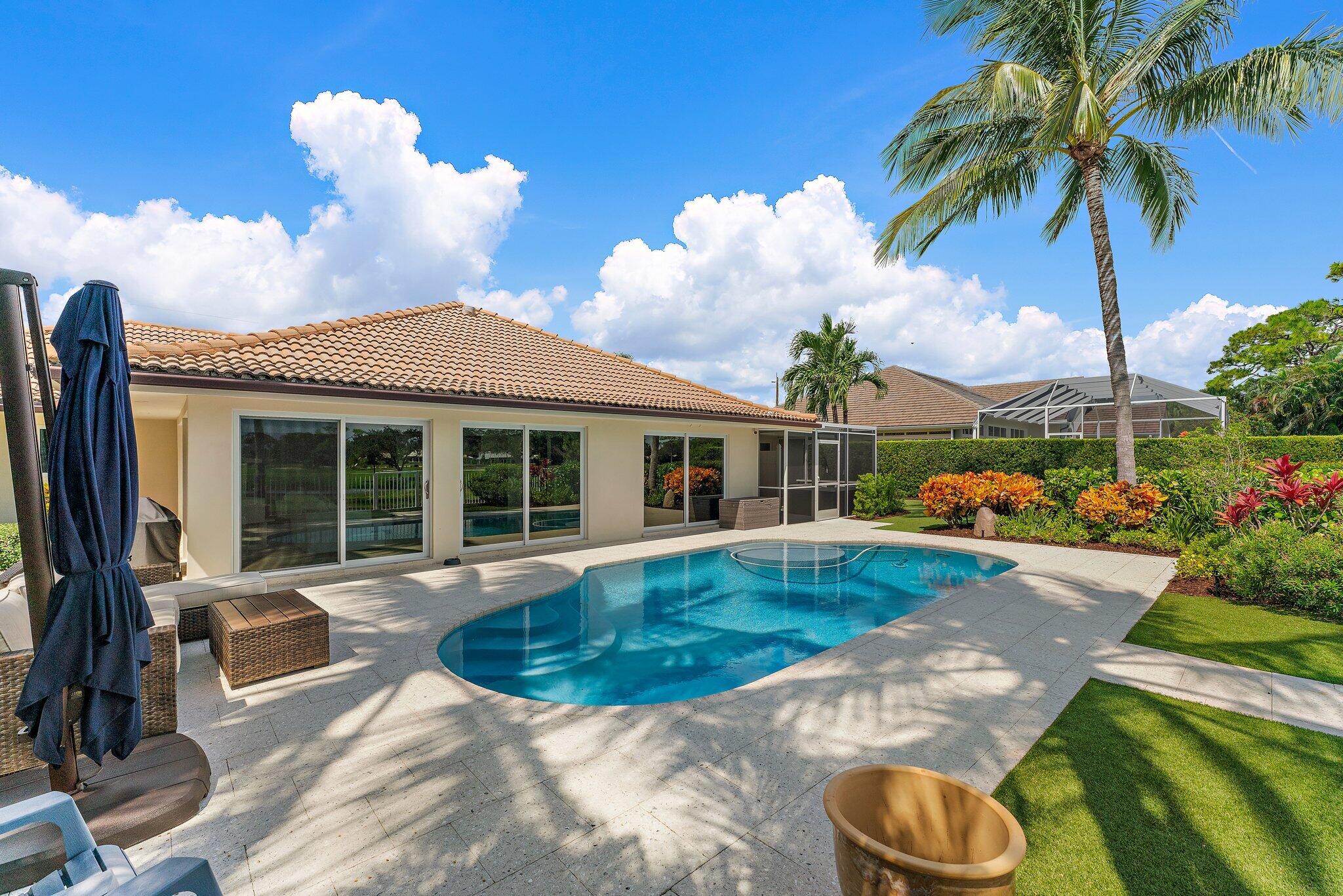 210 Golfview Drive Tequesta, FL 33469 - Photo 23 of 27 a view of a house with backyard and sitting area