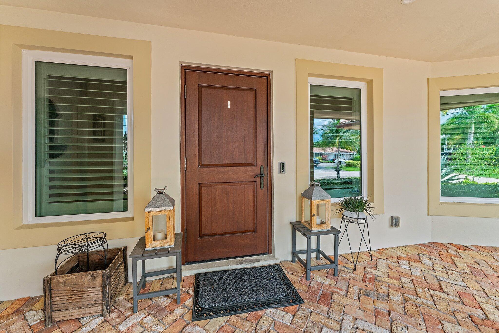 210 Golfview Drive Tequesta, FL 33469 - Photo 25 of 27 a bedroom with furniture and a window