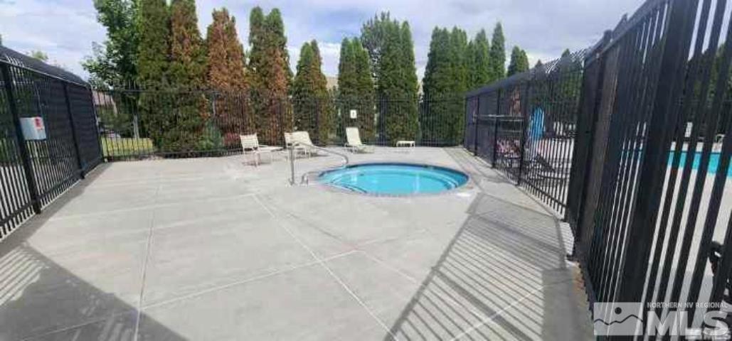 6850 Sharlands Avenue, Unit 2090 Reno, NV 89523 - Photo 4 of 10 a view of outdoor space and garden