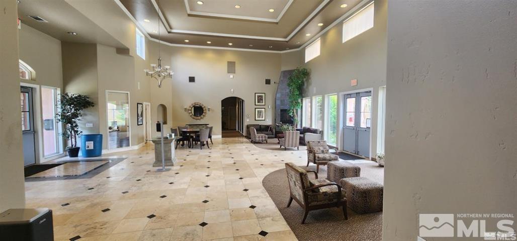 6850 Sharlands Avenue, Unit 2090 Reno, NV 89523 - Photo 5 of 10 a view of a livingroom with furniture and windows