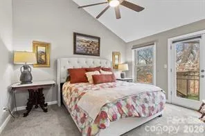 a bedroom with bed and a window