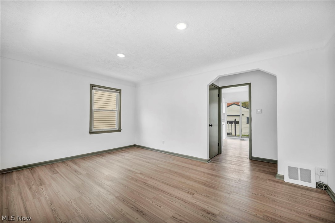 1609 Mapledale Road Wickliffe, OH 44092 - Photo 7 of 46 Spare room featuring hardwood / wood-style flooring