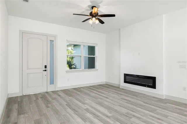 a view of room window and wooden floor