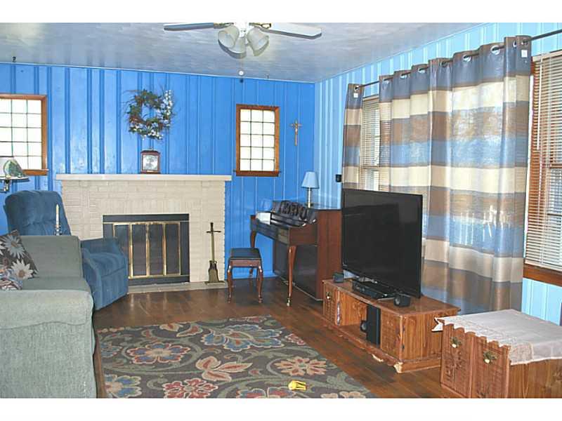 1065 Mercer Road Beaver Falls, PA 15010 - Photo 3 of 15 Living Room. Spacious living room with brick fireplace