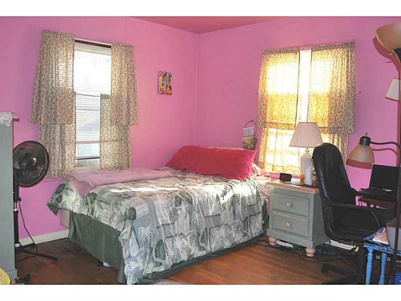 1065 Mercer Road Beaver Falls, PA 15010 - Photo 7 of 15 Bedroom. Large corner bedroom with hardwood flooring