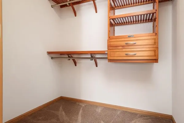 a view of a room with racks on the wall