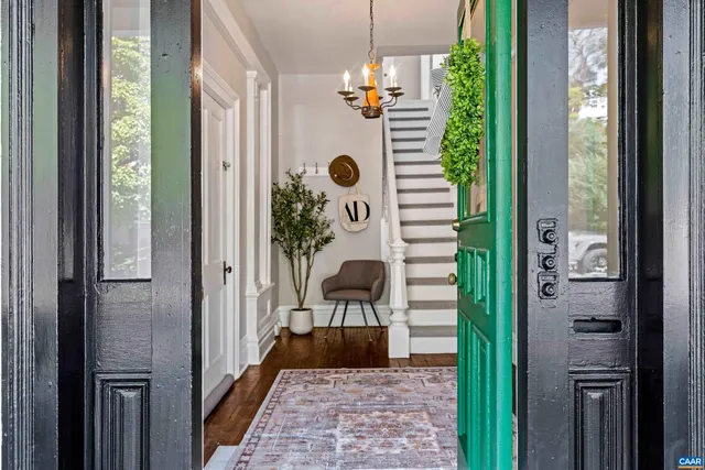 a view of a bathroom from a corridor