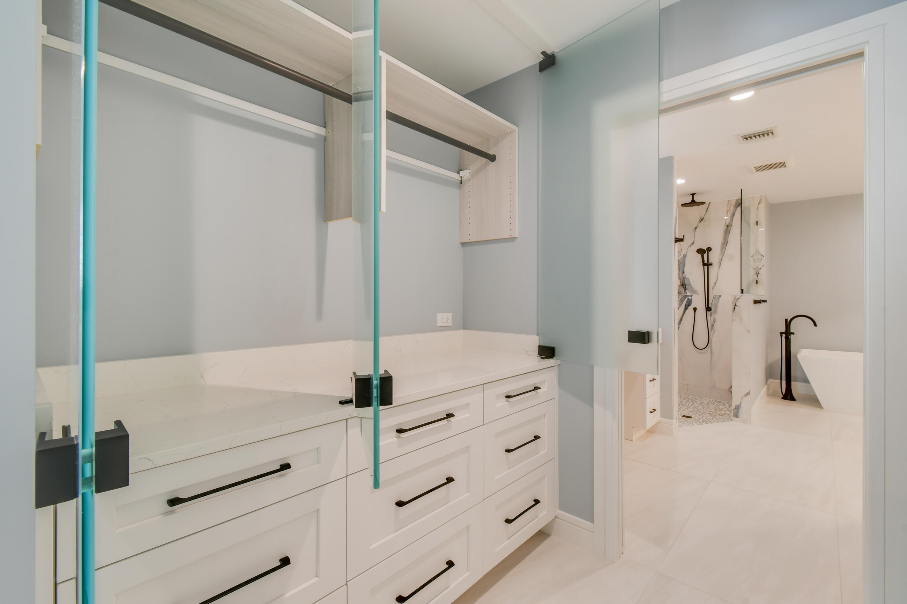 438 River Edge Road Jupiter, FL 33477 - Photo 29 of 80 a bathroom with a shower