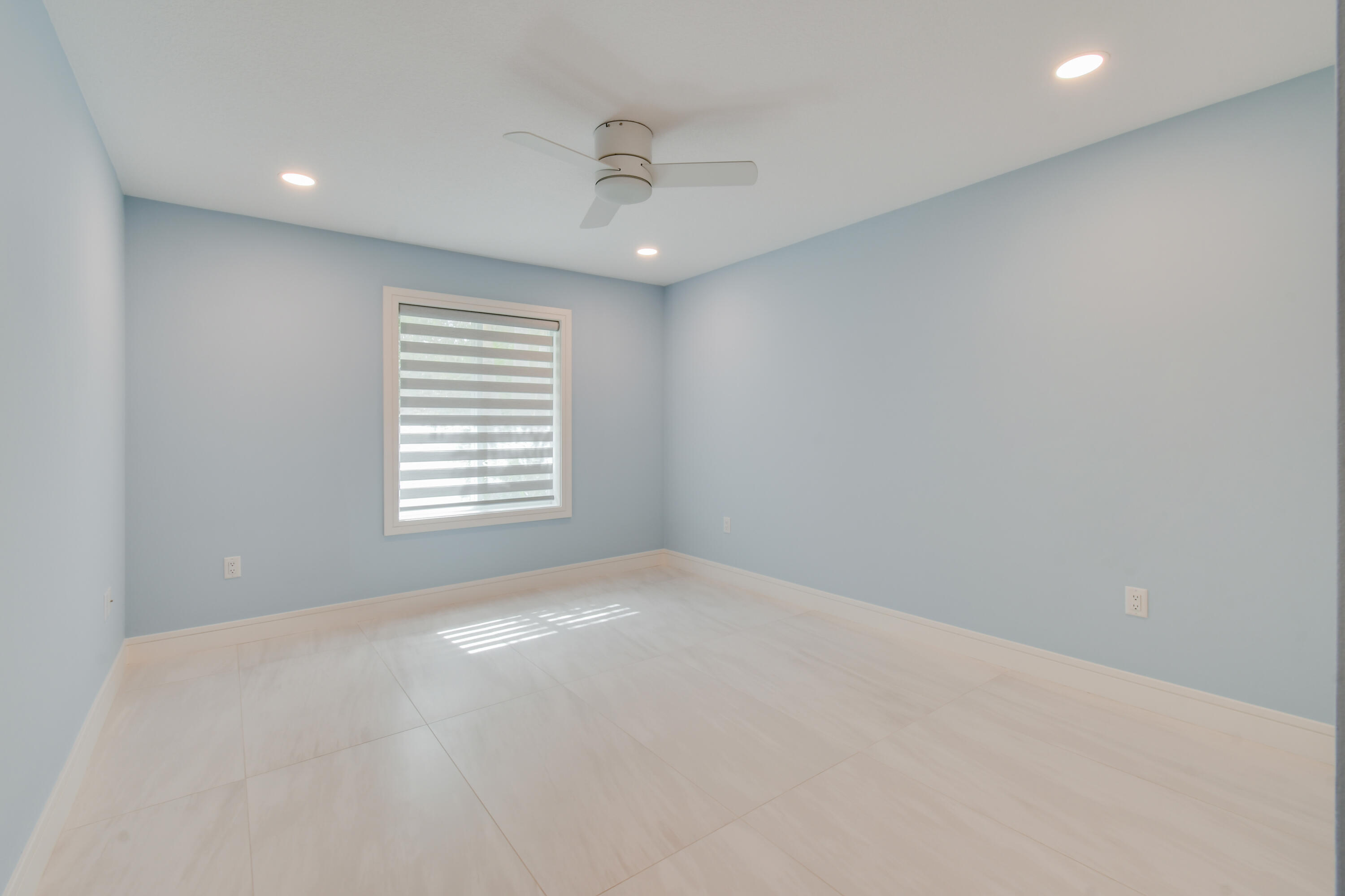 438 River Edge Road Jupiter, FL 33477 - Photo 41 of 80 a view of an empty room with a window
