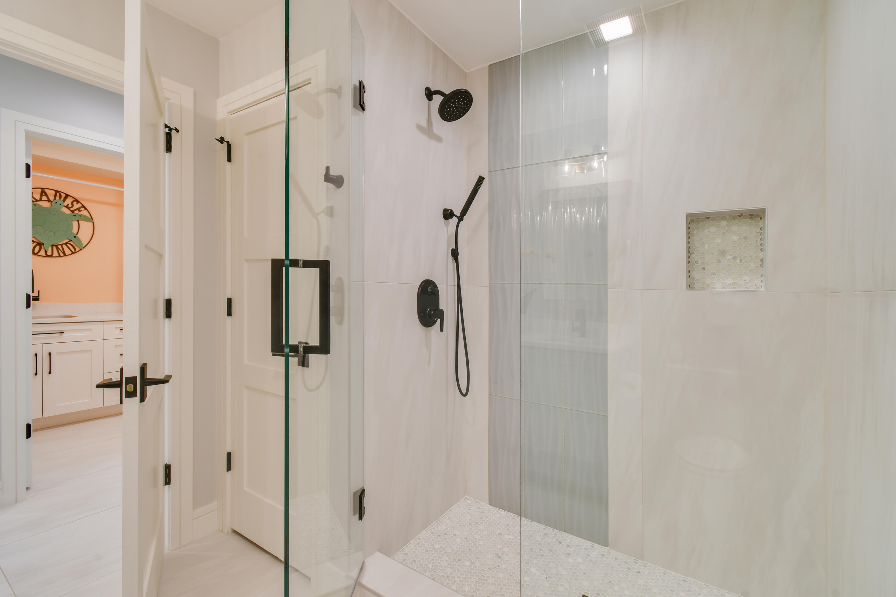 438 River Edge Road Jupiter, FL 33477 - Photo 46 of 80 a bathroom with a shower