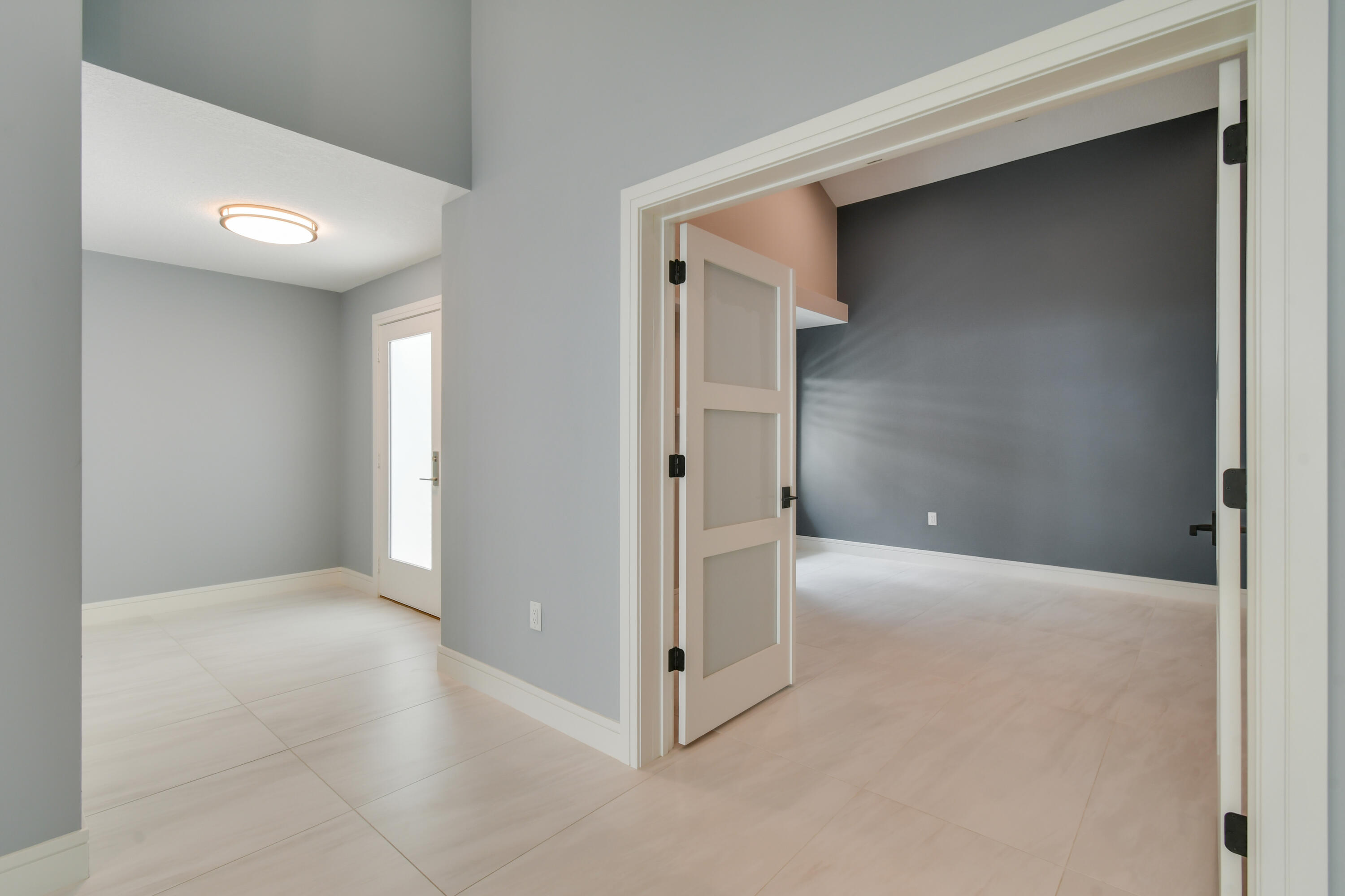 438 River Edge Road Jupiter, FL 33477 - Photo 47 of 80 Foyer and entry to 3rd Bedroom or Office