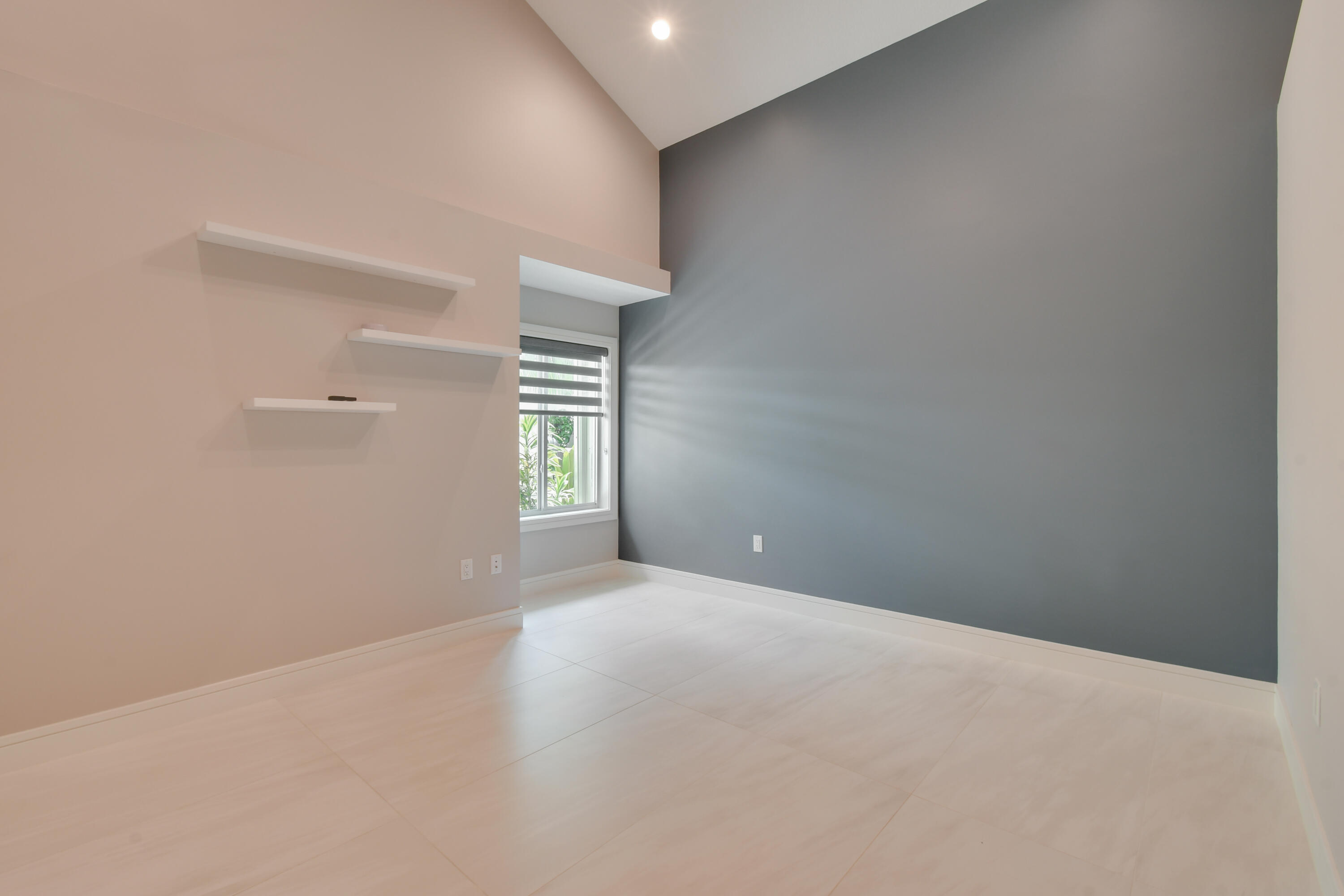 438 River Edge Road Jupiter, FL 33477 - Photo 49 of 80 a view of an empty room with a window