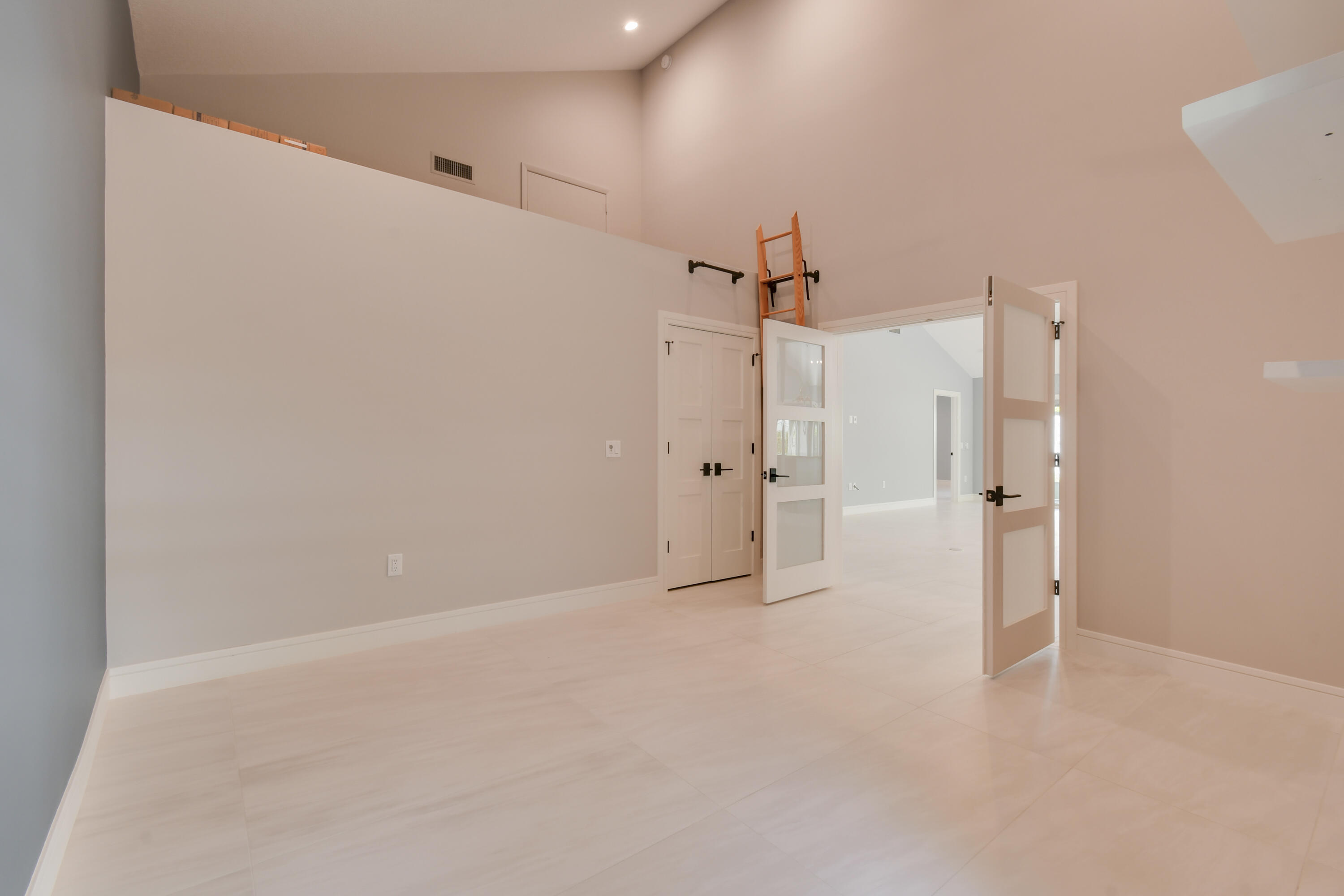 438 River Edge Road Jupiter, FL 33477 - Photo 51 of 80 an empty room with a cabinet and a shower