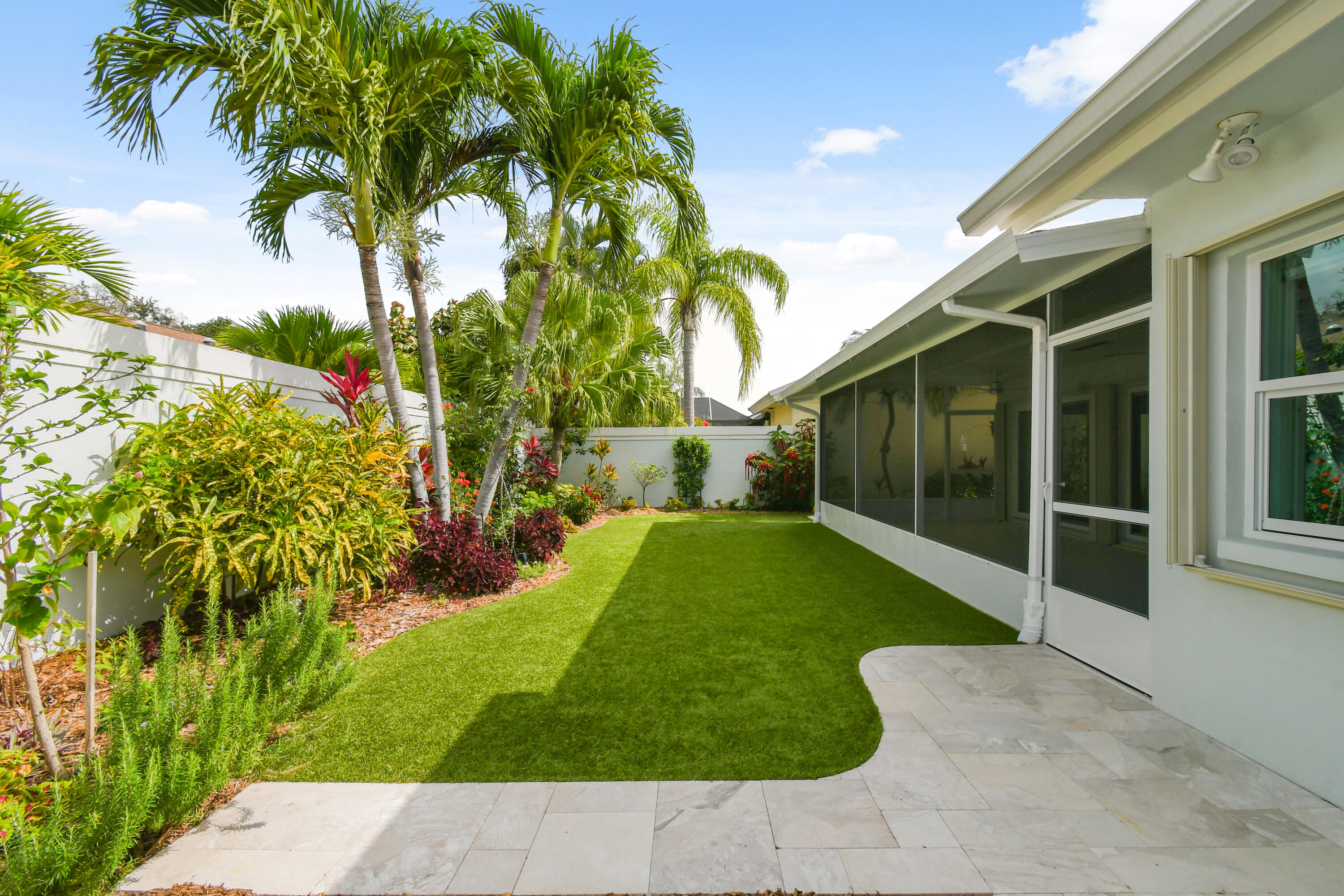 438 River Edge Road Jupiter, FL 33477 - Photo 54 of 80 Lovely landscaped yard2