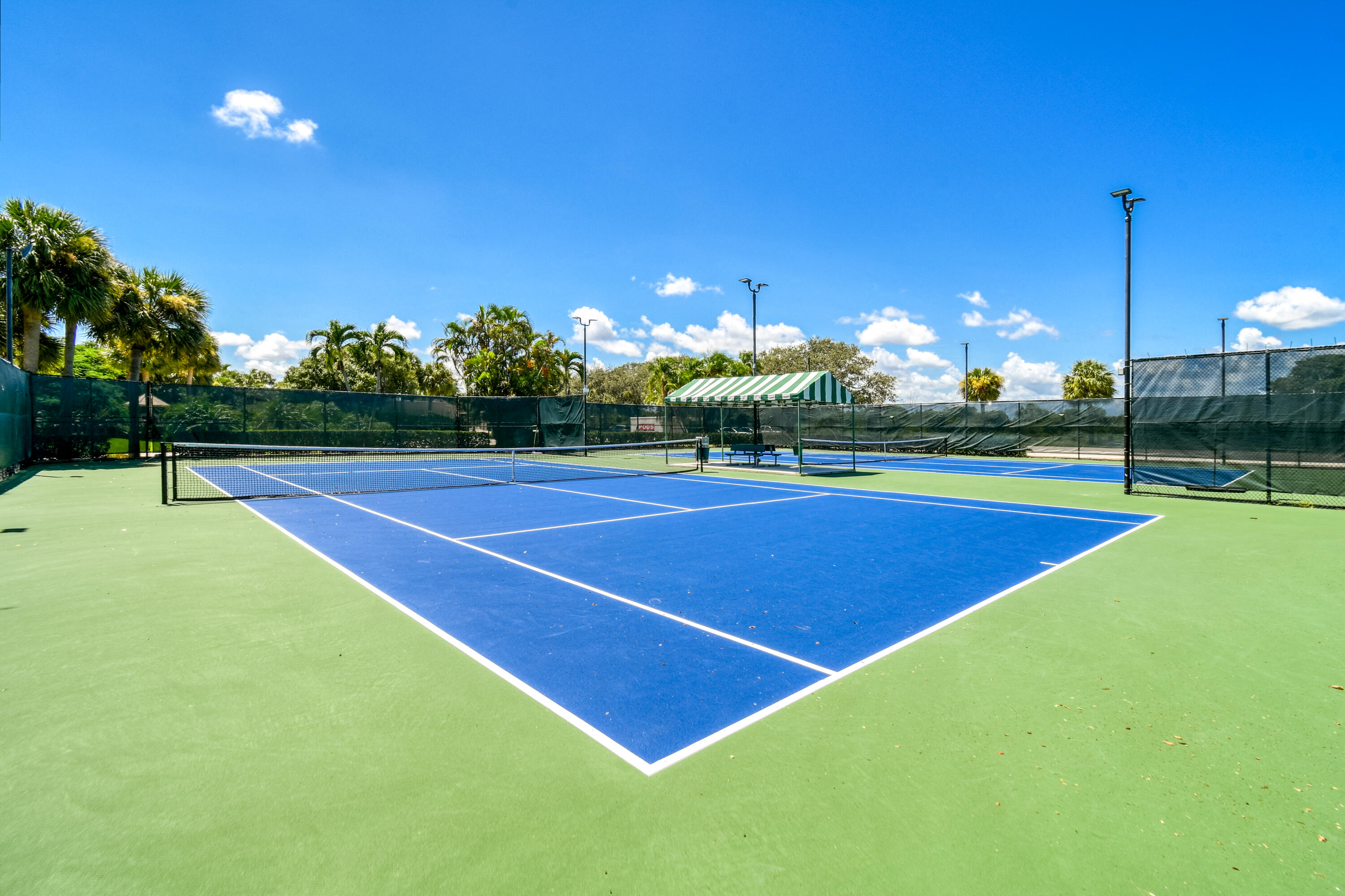 438 River Edge Road Jupiter, FL 33477 - Photo 73 of 80 a view of tennis court