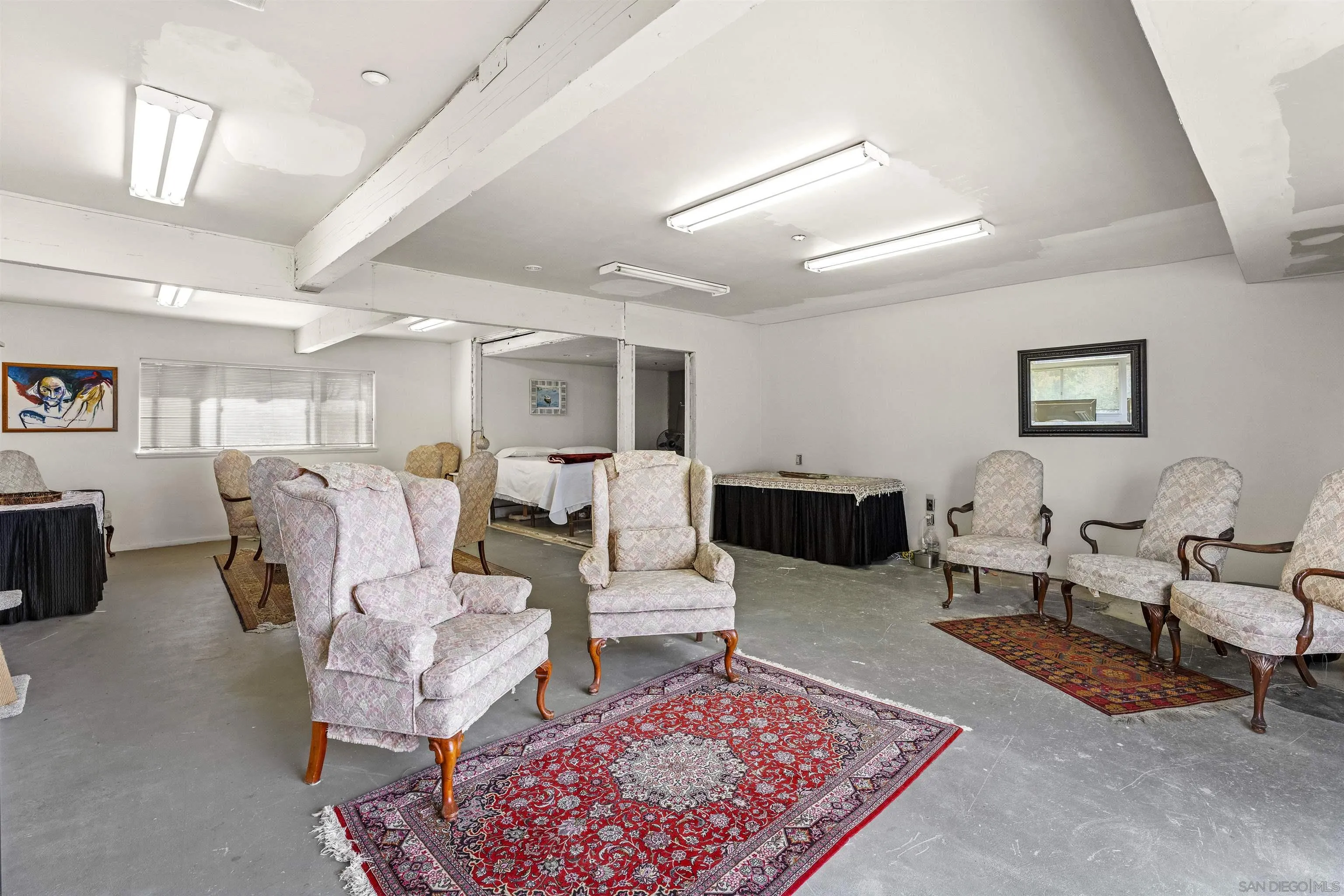 30659 Diaz Road Valley Center, CA 92082 - Photo 33 of 44 a living room with lots of furniture and a rug