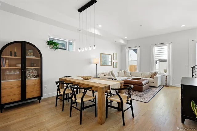 a view of a livingroom with furniture and a table