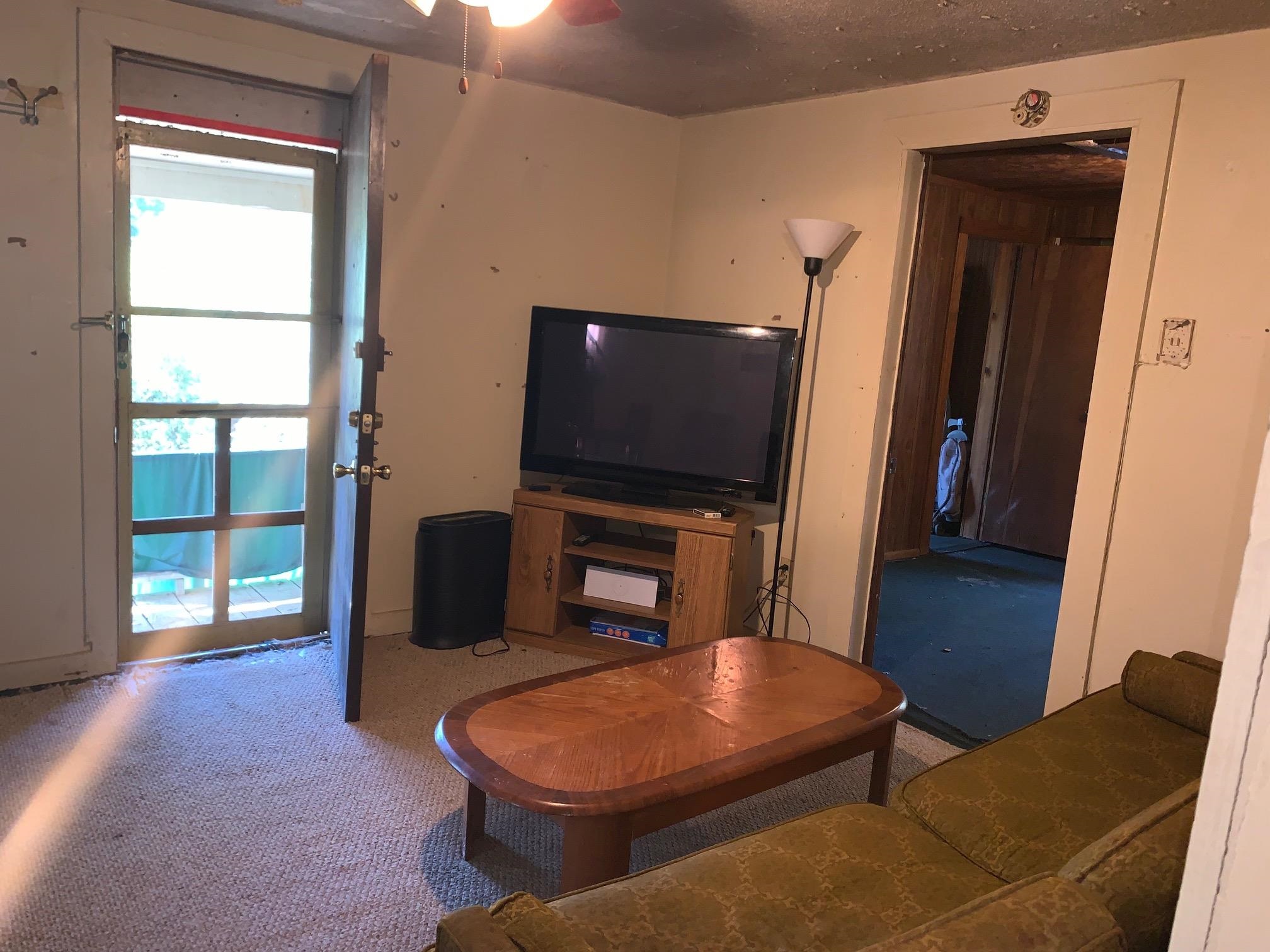 4496 Vernie Kirk Road Pocahontas, TN 38061 - Photo 19 of 30 a living room with furniture and a flat screen tv