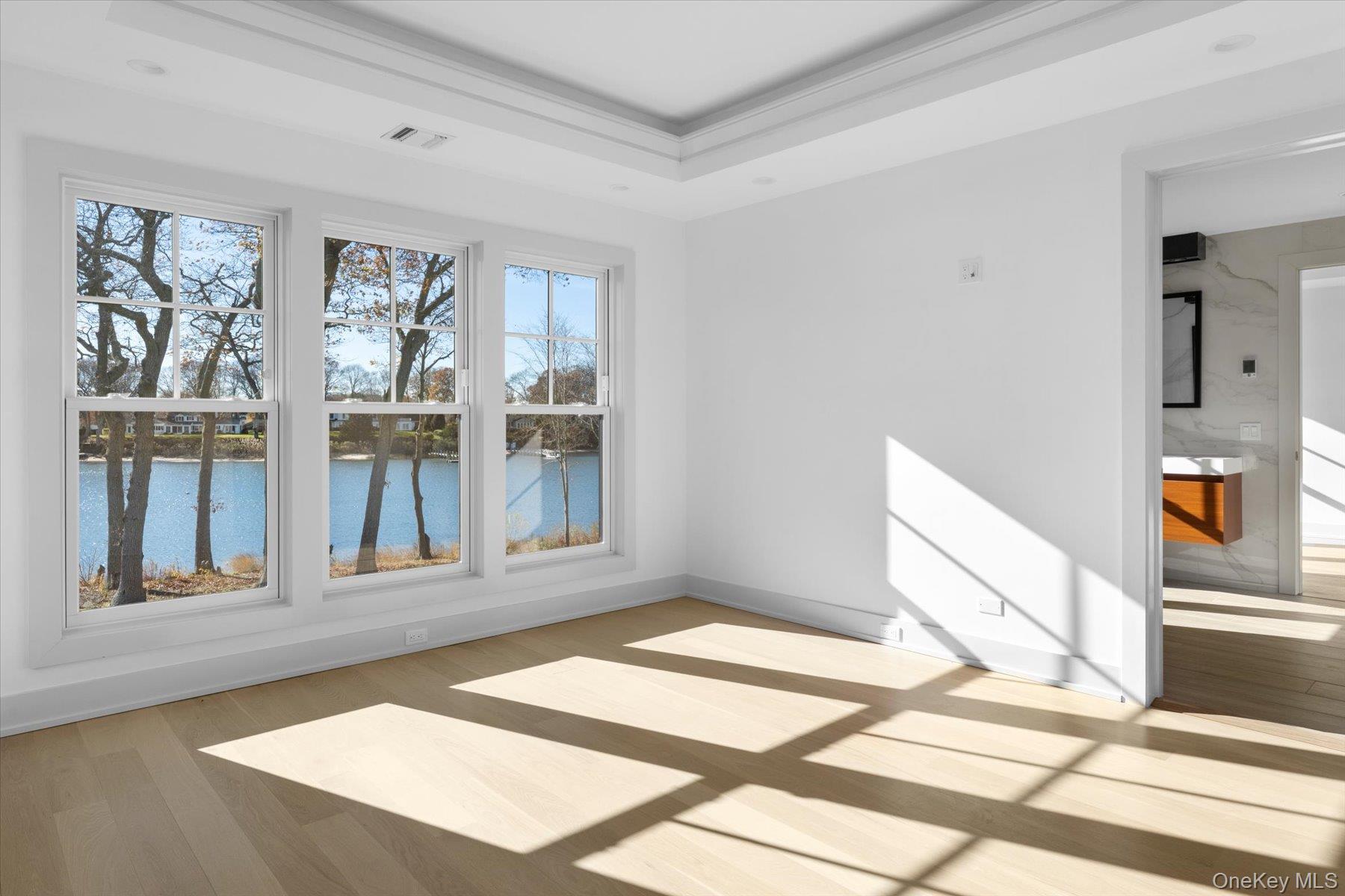 1750 Hobart Road Southold, NY 11971 - Photo 30 of 41 a view of a livingroom with wooden floor and furniture