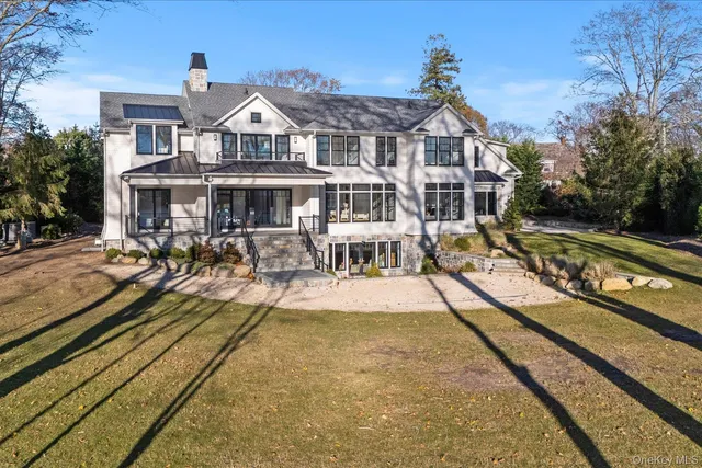 a front view of a house with swimming pool