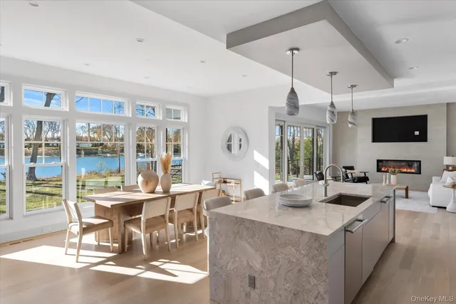 a view of a dining room with furniture window and outside view