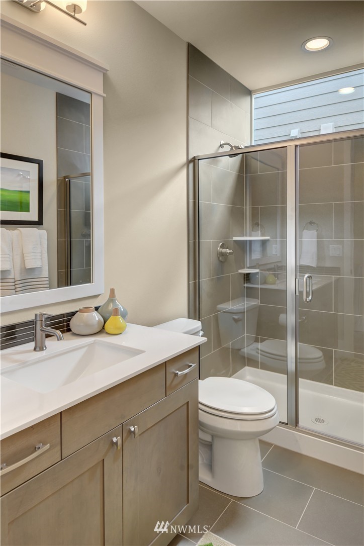 270 Field Place Southeast Renton, WA 98059 - Photo 9 of 20 a bathroom with a sink toilet and shower
