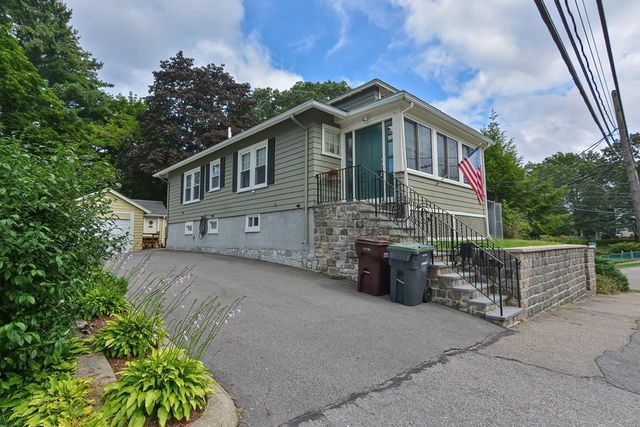 a front view of a house with balcony