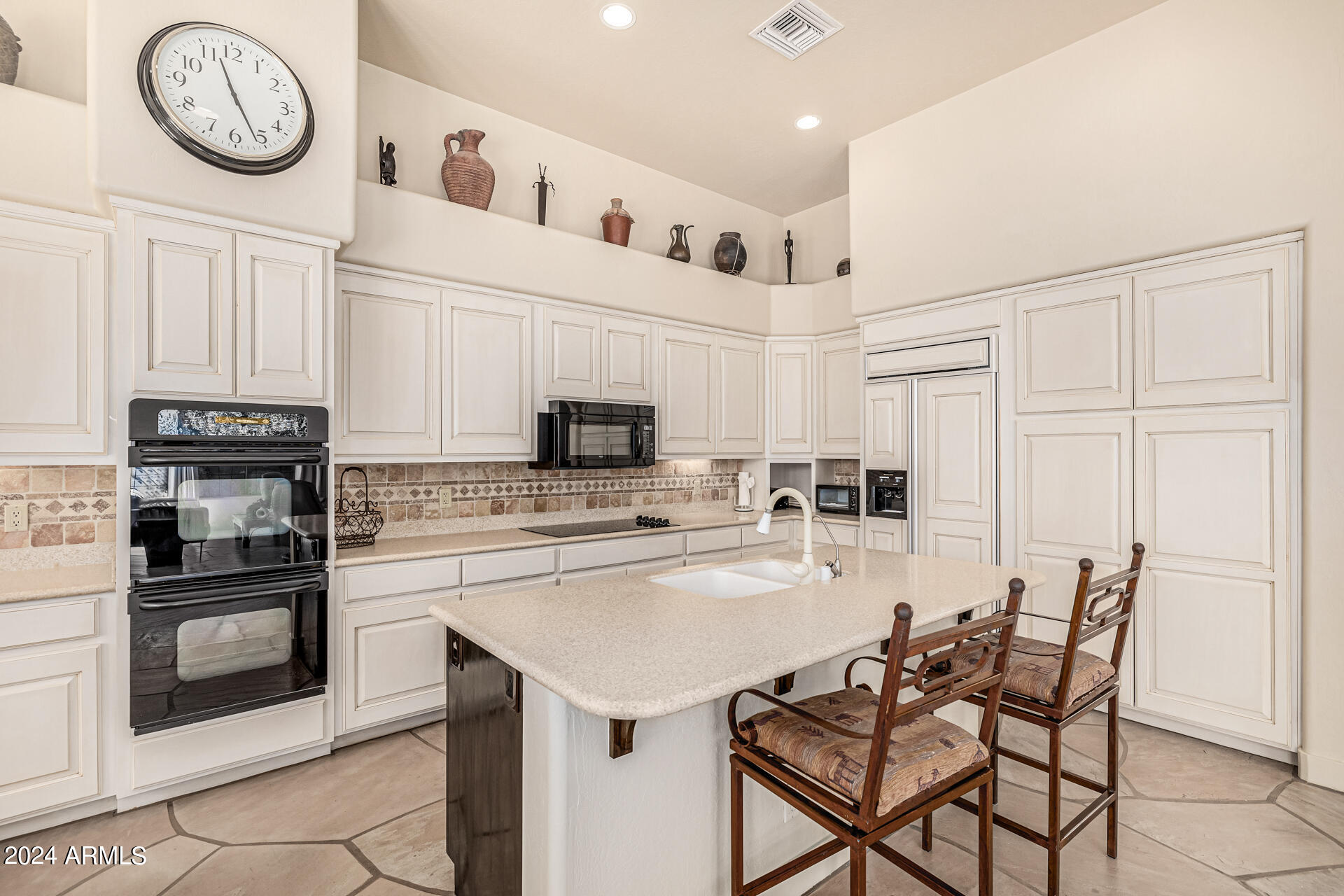 6437 North 28th Street Phoenix, AZ 85016 - Photo 15 of 53 a kitchen with a table and chairs