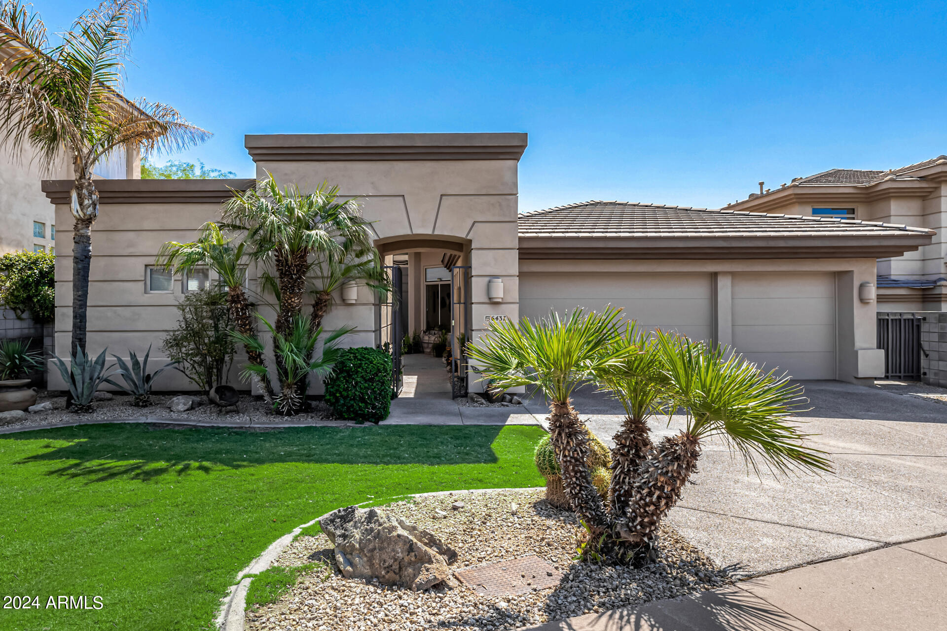 6437 North 28th Street Phoenix, AZ 85016 - Photo 2 of 53 a front view of a house with a yard