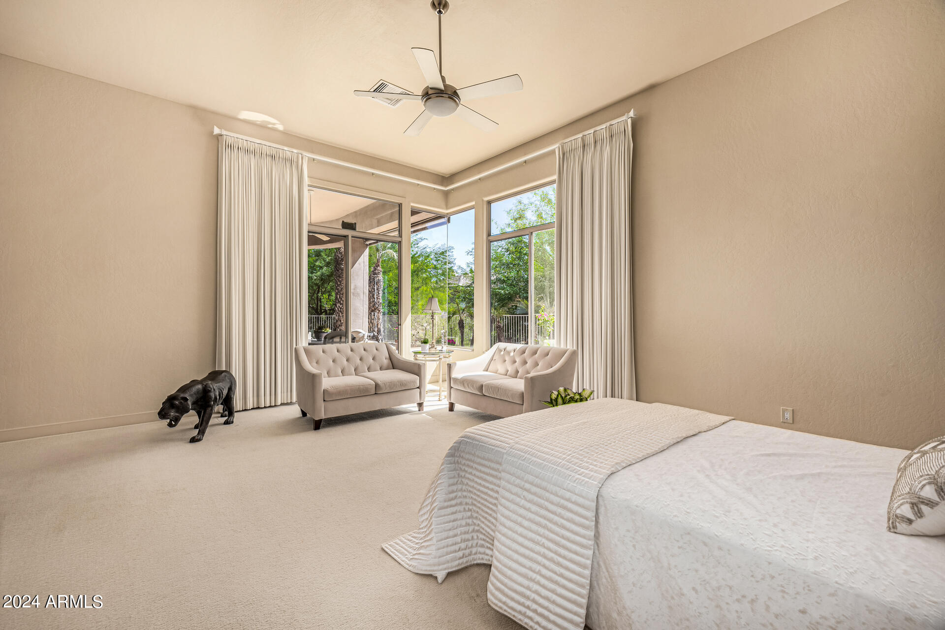6437 North 28th Street Phoenix, AZ 85016 - Photo 24 of 53 a spacious bedroom with a bed and large windows