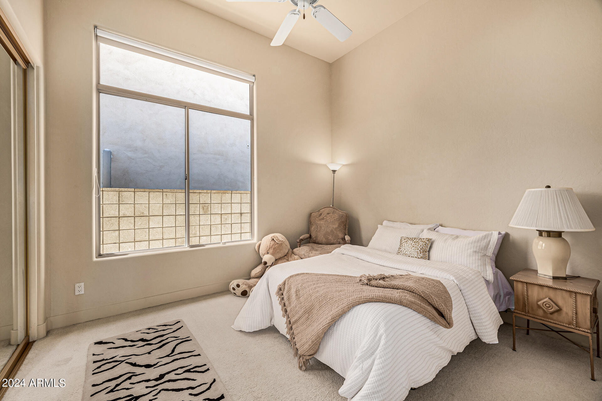 6437 North 28th Street Phoenix, AZ 85016 - Photo 34 of 53 a bedroom with a bed and a window