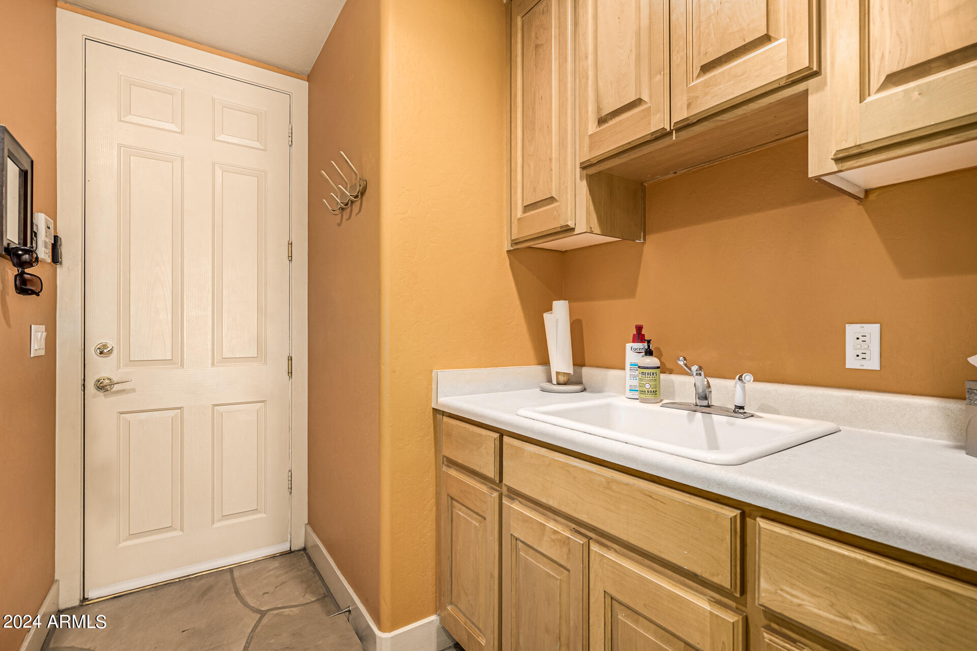 6437 North 28th Street Phoenix, AZ 85016 - Photo 36 of 53 a bathroom with a sink and a mirror