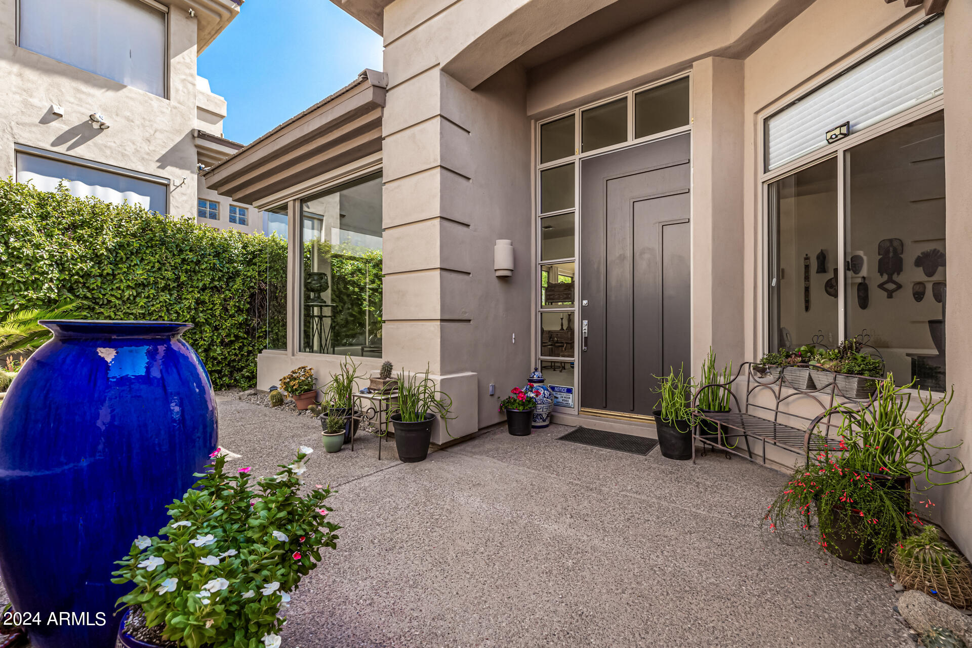 6437 North 28th Street Phoenix, AZ 85016 - Photo 4 of 53 a backyard of a house with outdoor seating