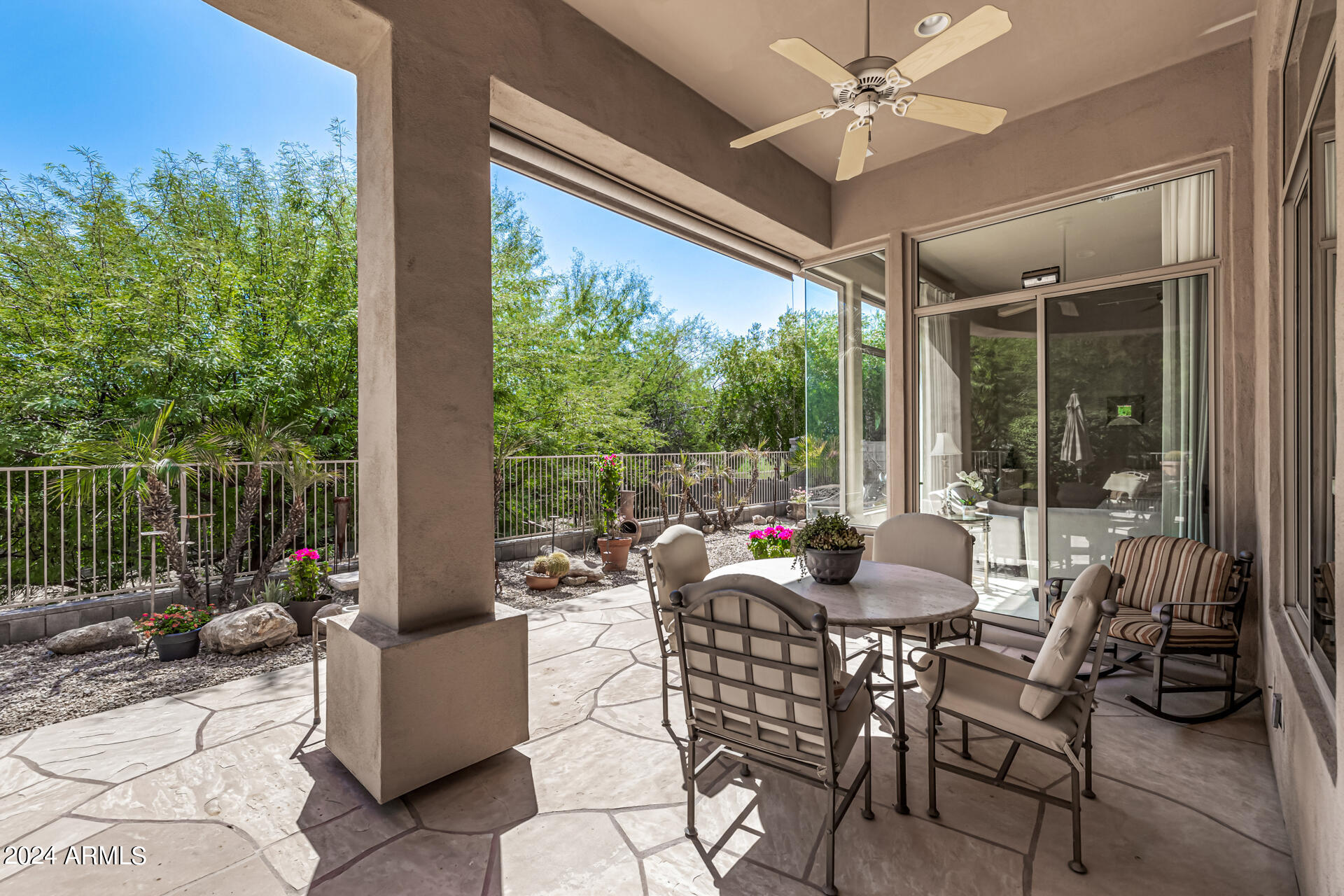 6437 North 28th Street Phoenix, AZ 85016 - Photo 42 of 53 a view of a patio with couches potted plants and a table