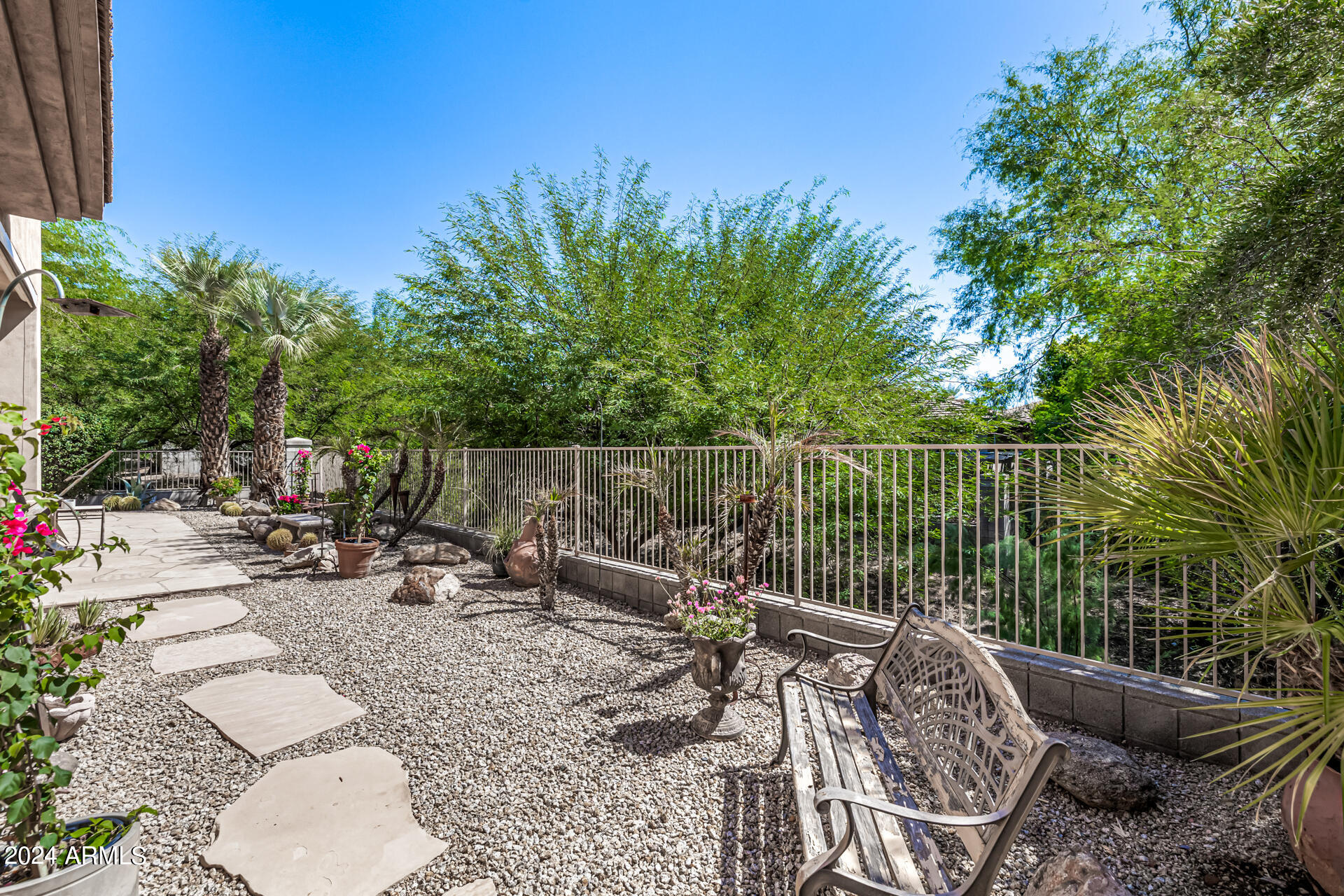 6437 North 28th Street Phoenix, AZ 85016 - Photo 44 of 53 a view of a chair and tables in the backyard