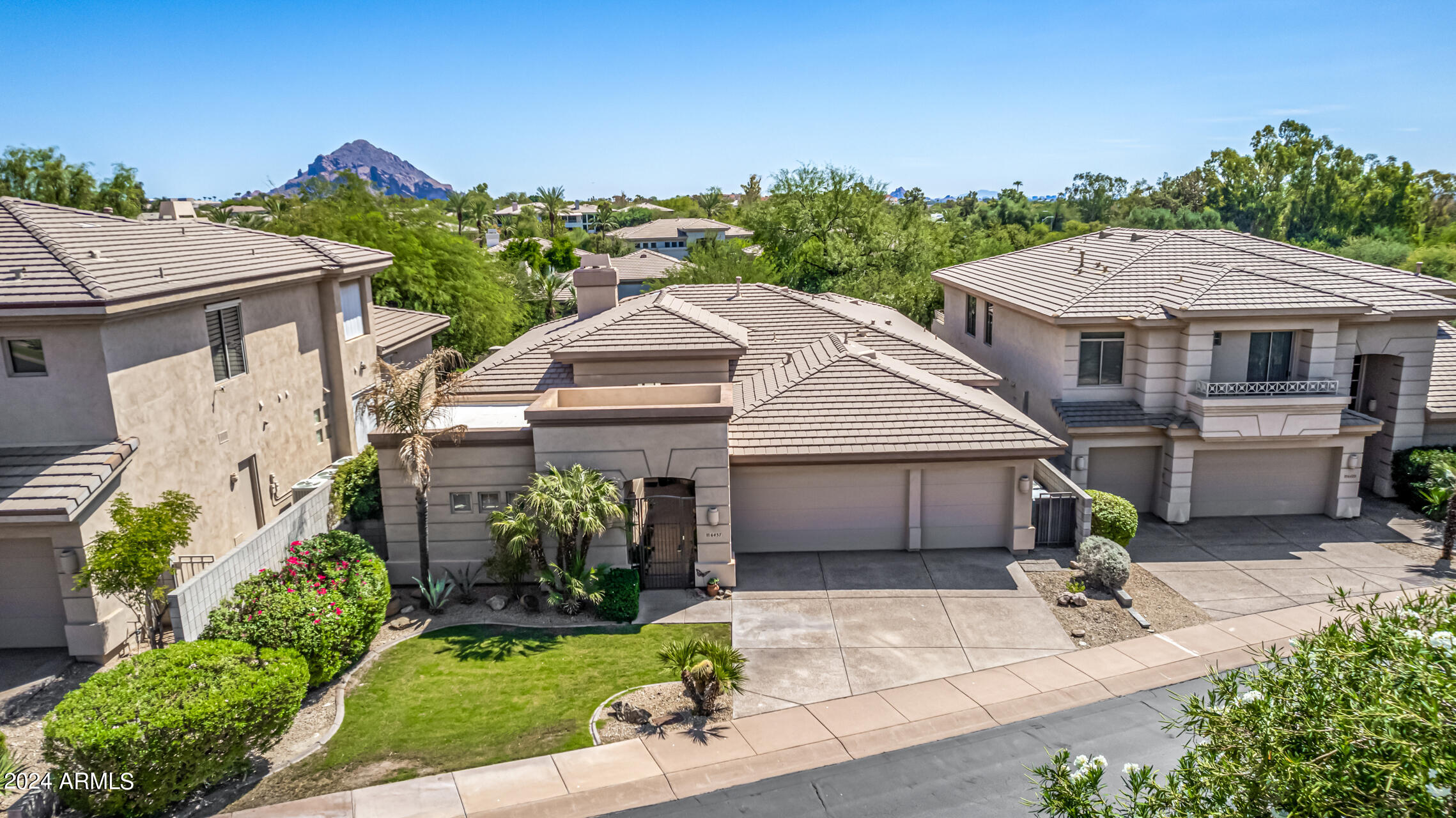 6437 North 28th Street Phoenix, AZ 85016 - Photo 47 of 53 a front view of a house with garden